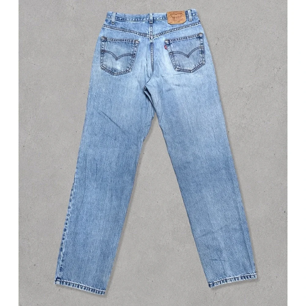 Vintage Levi's 550 Relaxed Fit Jeans Men's Size 34x34 (Fits 32x34) Blue Distress